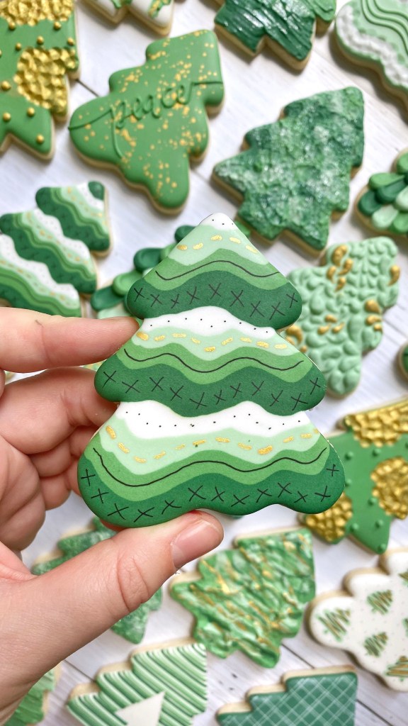 christmas tree cookie decorated with royal icing 