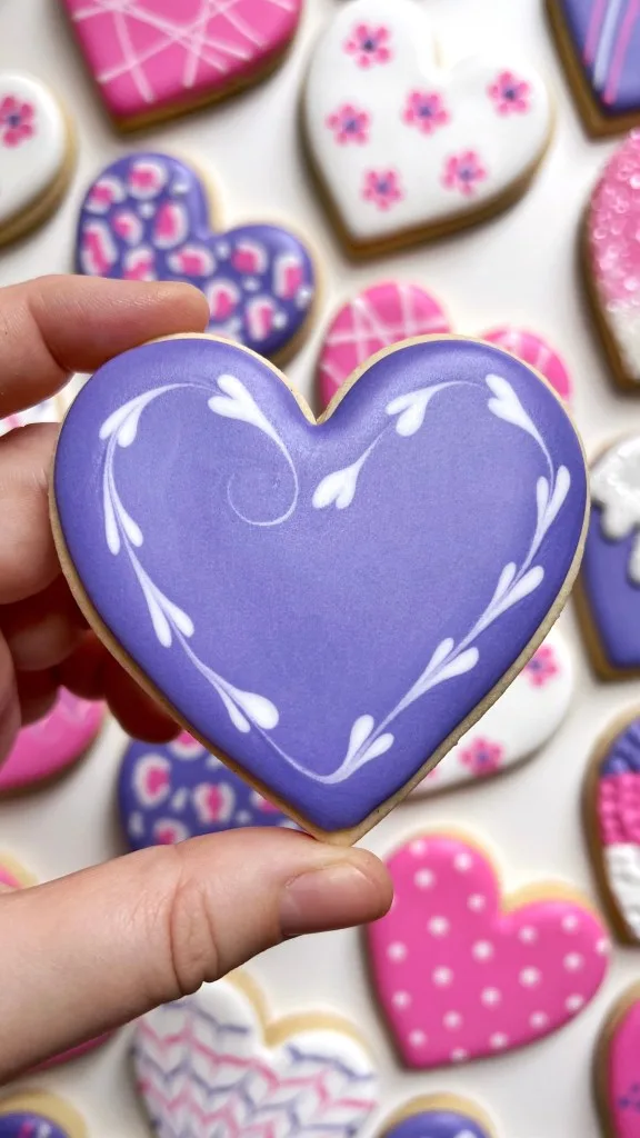 heart cookie decorated with royal icing 