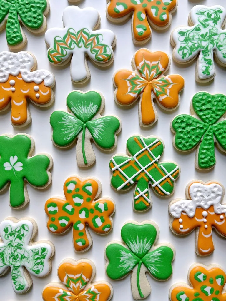 photo of shamrock cookies with perfect royal icing consistency not too thick or too thin