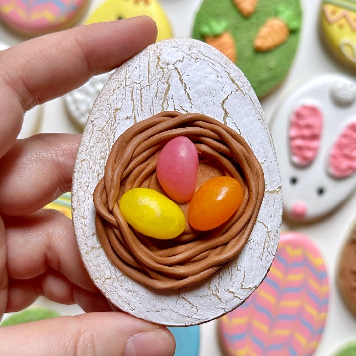 nest easter egg sugar cookie decorated with royal icing 