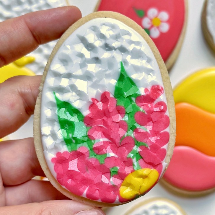 stained glass easter egg cookie decorated with royal icing