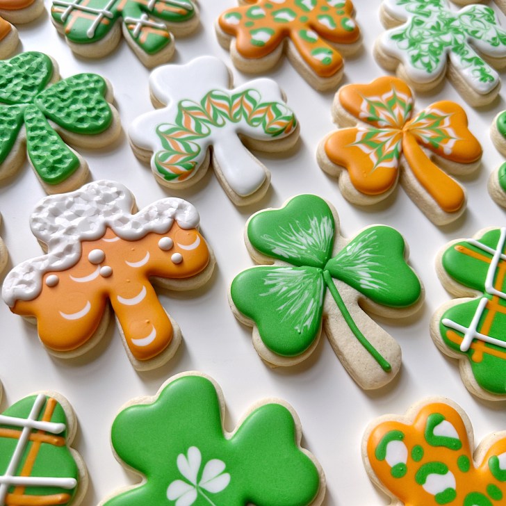 easy shamrock cookies decorated with royal icing 