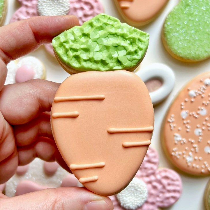easy carrot easter cookies decorated with royal icing