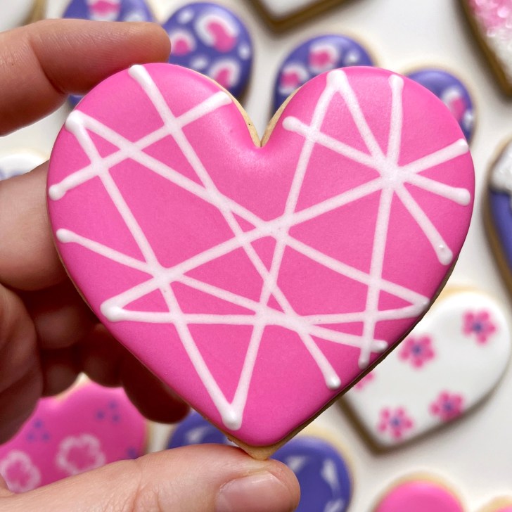 pink geometric lines easy heart cookies decorated with royal icing 
