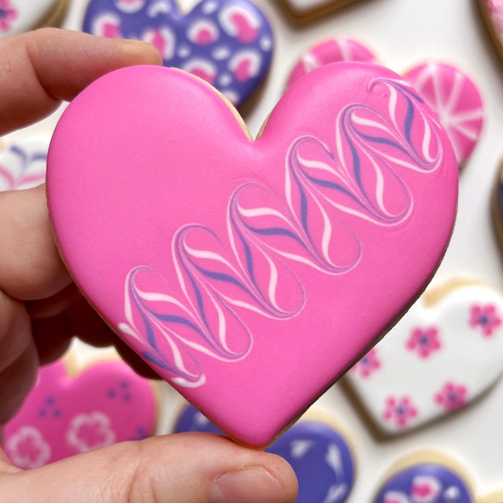 pink Easy Valentine's Day Cookies decorated with royal icing 