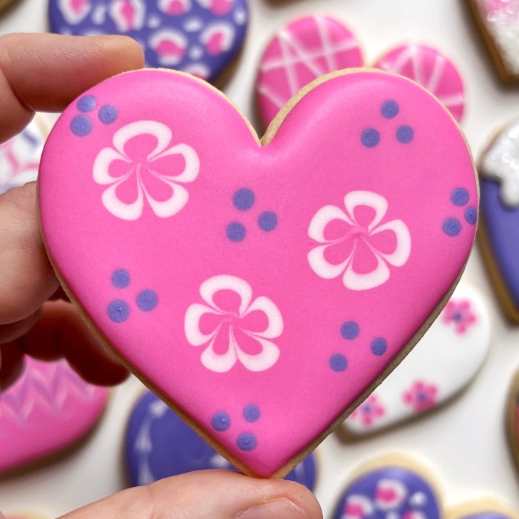 pink Easy Valentine's Day Cookies decorated with royal icing 