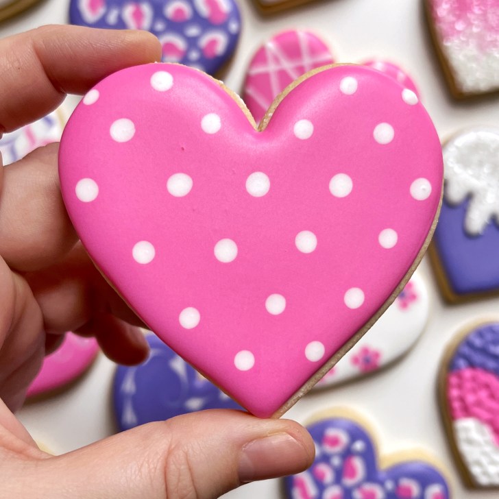 pink polka dots easy heart cookies decorated with royal icing 