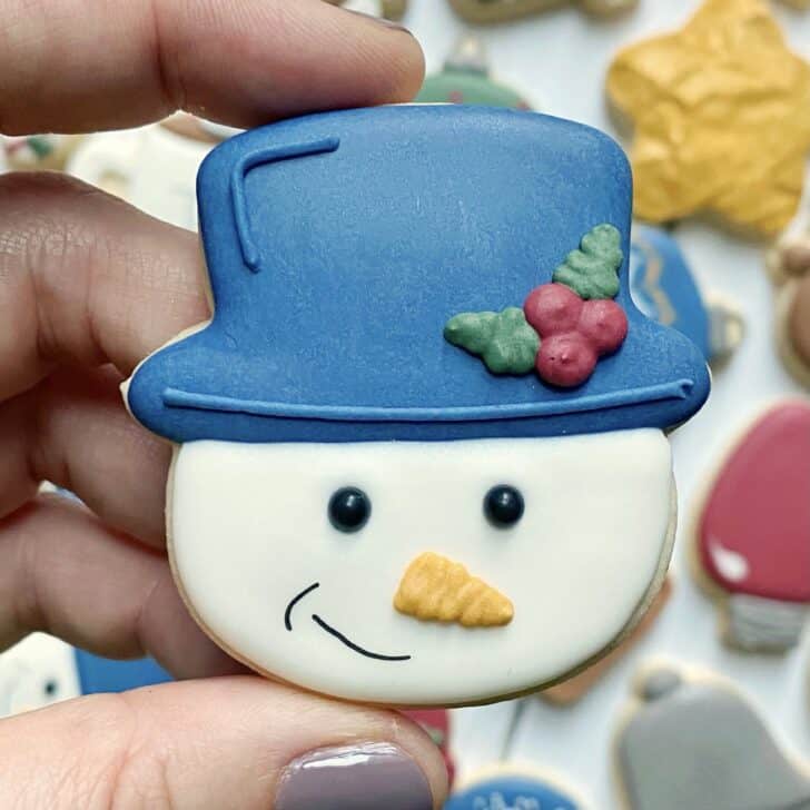 Mini Snowman Cookies decorated with royal icing